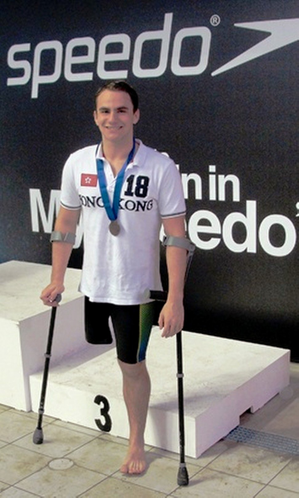 Aaron Zweig shows off his bronze medal in 2013.