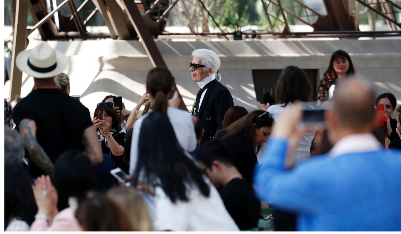 German fashion designer Karl Lagerfeld was awarded the Médaille Grand Vermeil de la Ville at the end of the show. Photo: AFP
