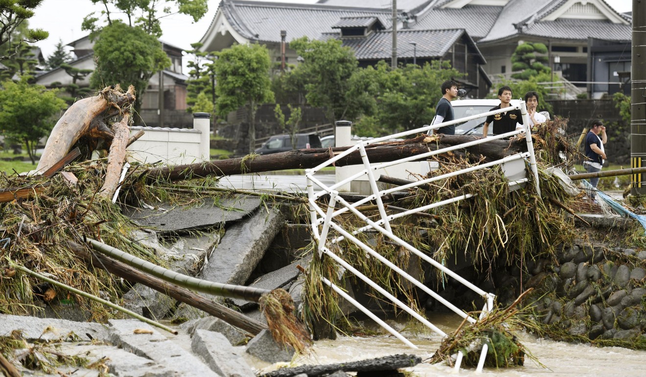 A damaged bridge in Asakura. Photo: Kyodo
