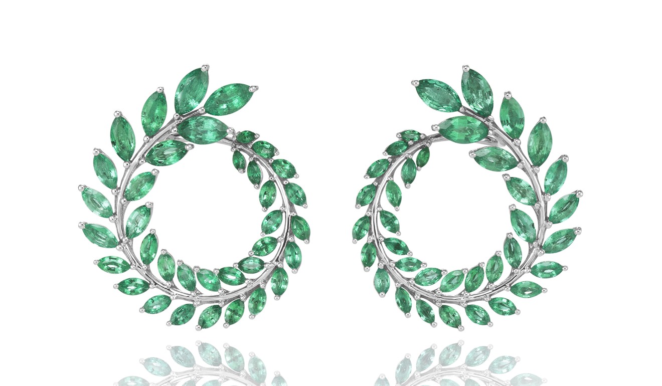 These earrings, in 18ct white ethical gold certified ‘Fairmined’, are adorned with marquise-cut emeralds from Zambia in the form of delicate leaves. Price on request