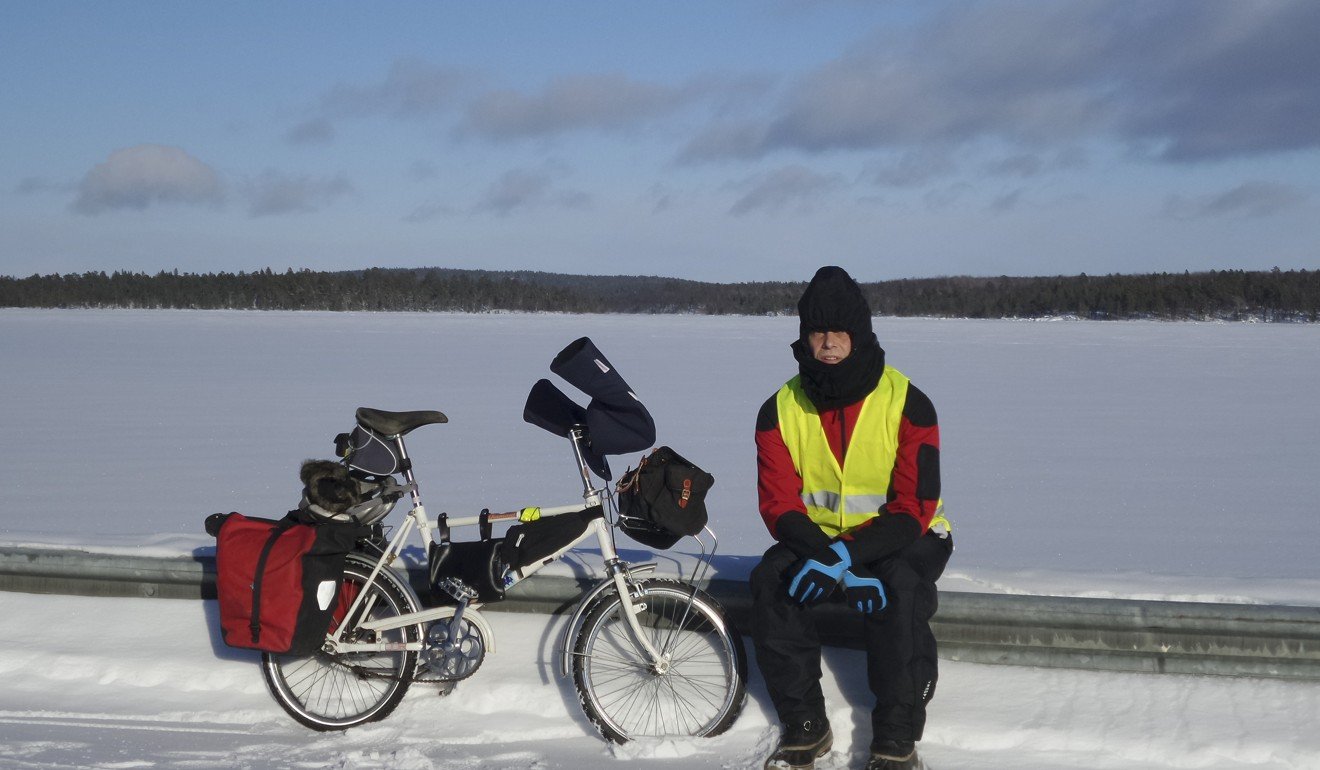 Moore during his trip through Europe on a “Communist-era shopping bike with tiny wheels and no gears”. His journey began in Finland in winter. Photo: Courtesy of Tim Moore