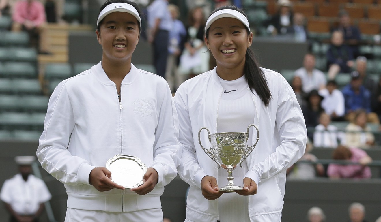 Claire Liu celebrates with the trophy after beating Ann Li. (AP Photo/Tim Ireland)
