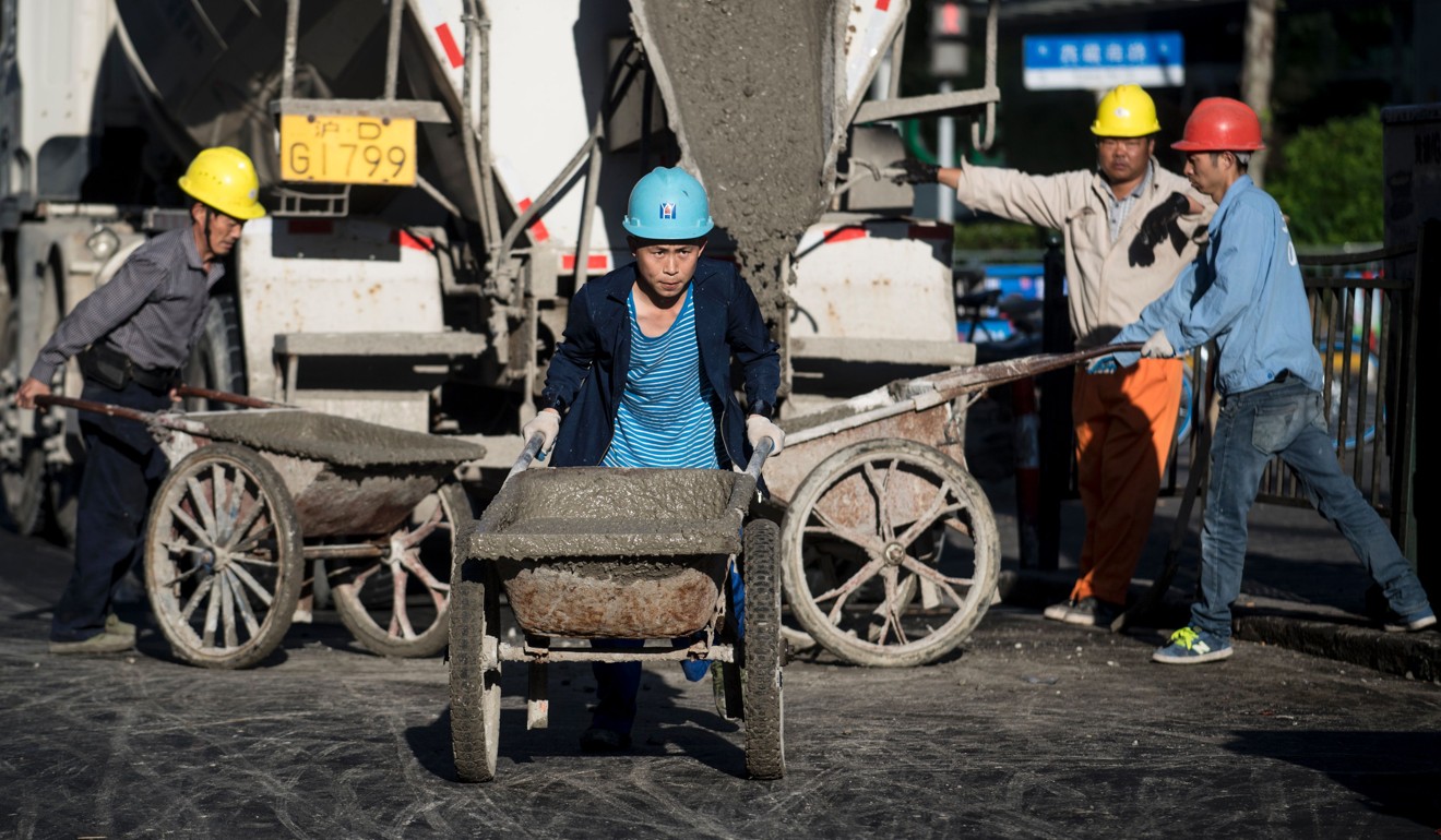 Analysts say that earnings of old-economy firms such as this cement producer have been improving as China’s campaign to remove excess capacity is completing ahead of schedule, triggering a rally in these stocks. Photo: AFP