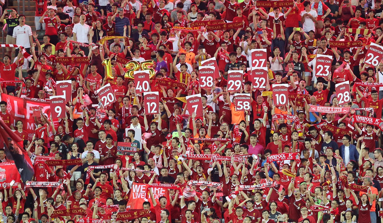 Liverpool fans cheer on their team during the Premier League Asia Trophy final,