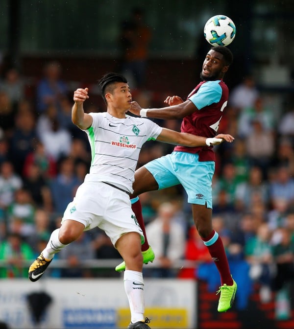Yuning Zhang in action for Werder Bremen in a pre-season friendly against West Ham United. Photo: Reuters