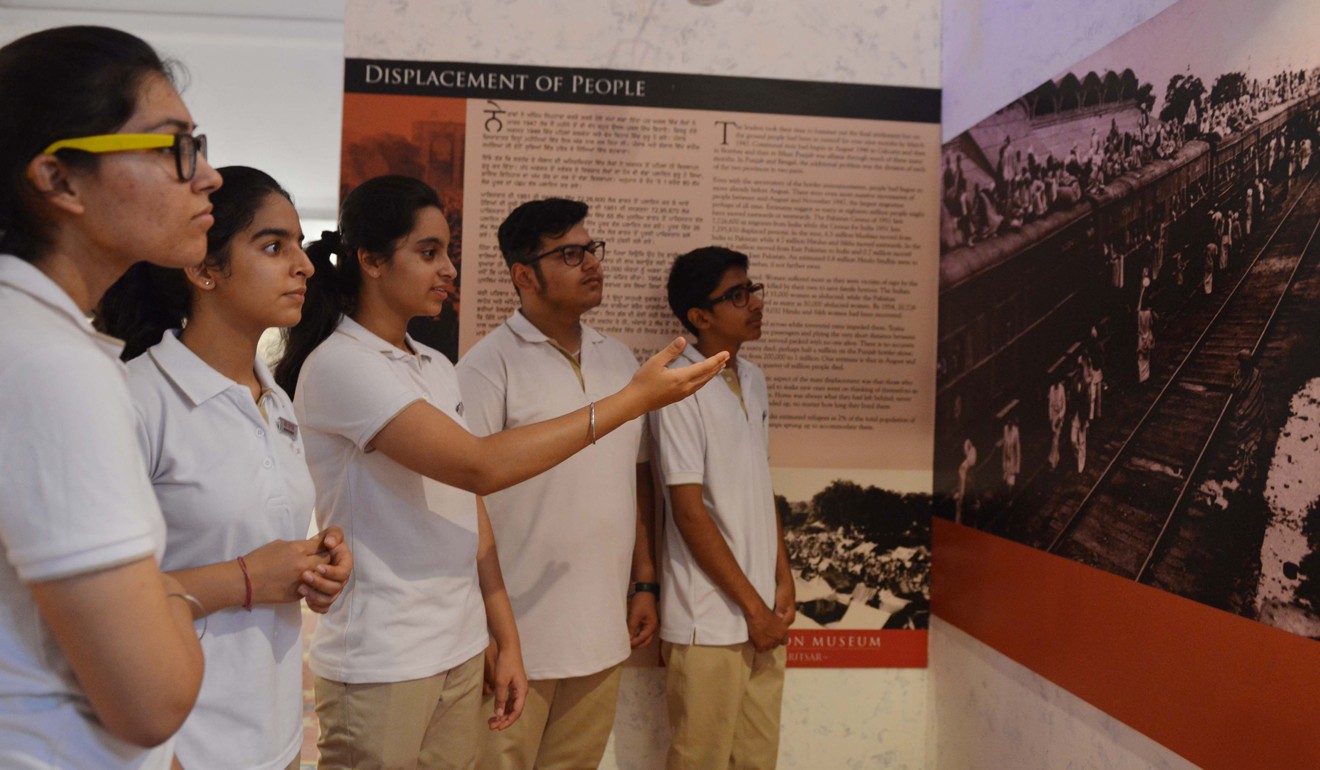 Indian students look at photographs taken during the time of India-Pakistan Partition at the Partition Museum in Amritsar. Photo: AFP