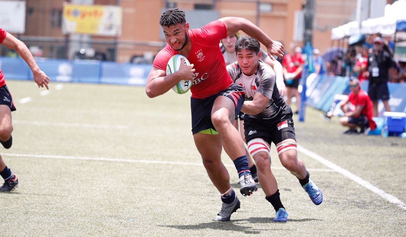 Max Denmark attempts to stride through a tackle during Hong Kong's successful Asia Rugby Under-20 Sevens Series campaign.