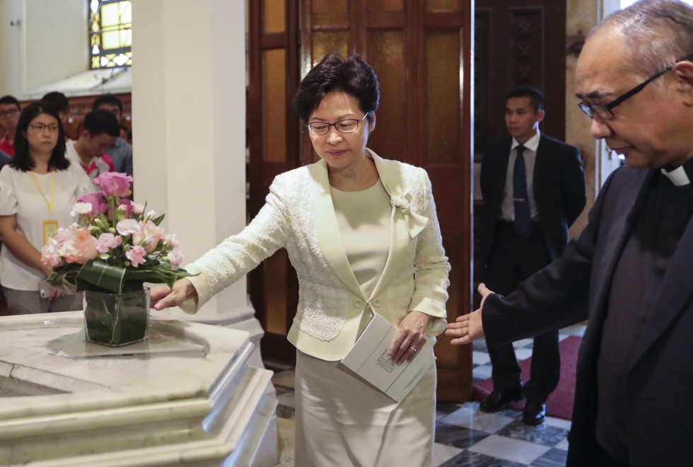 Chief Executive Carrie Lam arrives at the cathedral to attend the eucharistic celebration. Photo: Edward Wong
