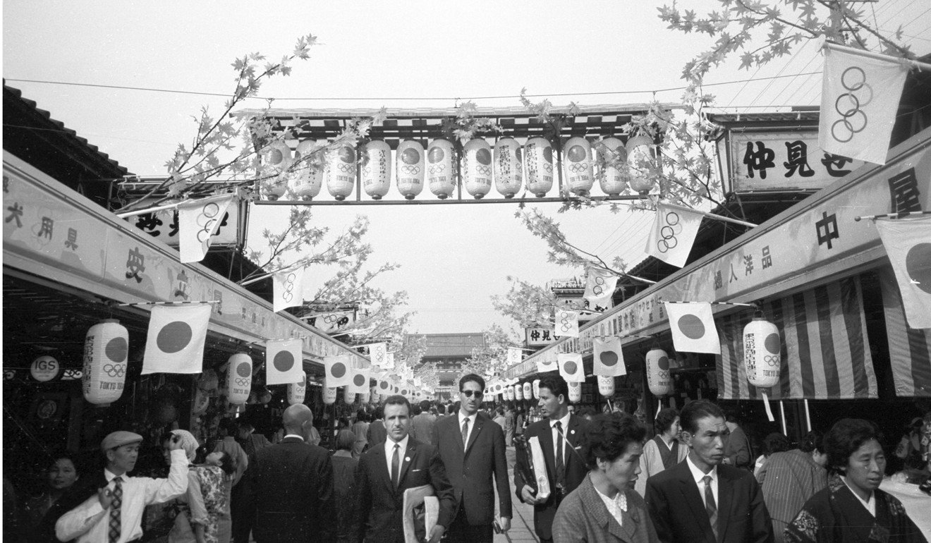 Nakamise Street in Asakusa, Tokyo, is decked out to celebrate Japan’s hosting of the 1964 Tokyo Olympics, in October of that year. The 1960s heralded the country’s post-war economic miracle. Photo: Kyodo