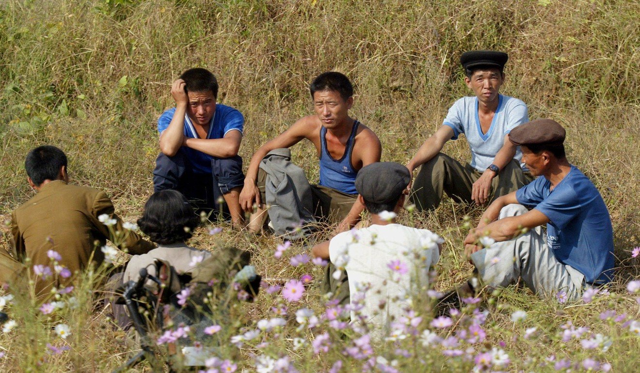 A group of North Korean farm labourers work on a field in the country’s northwestern region. Photo: SCMP Pictures