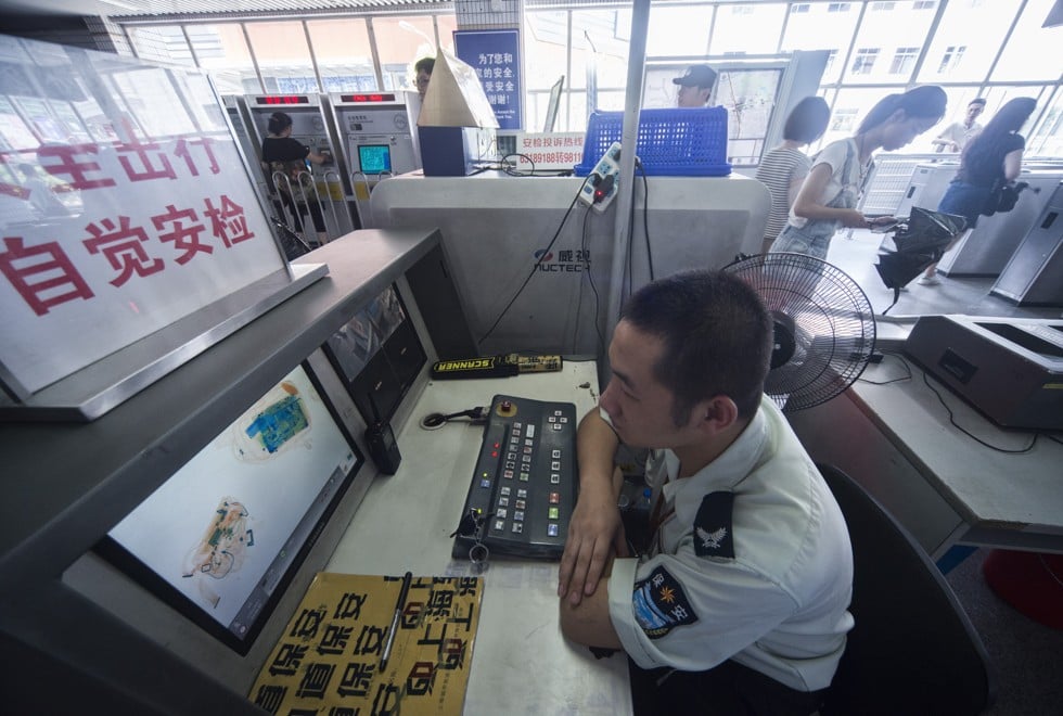 Security checks at the Zhongshan Park station.