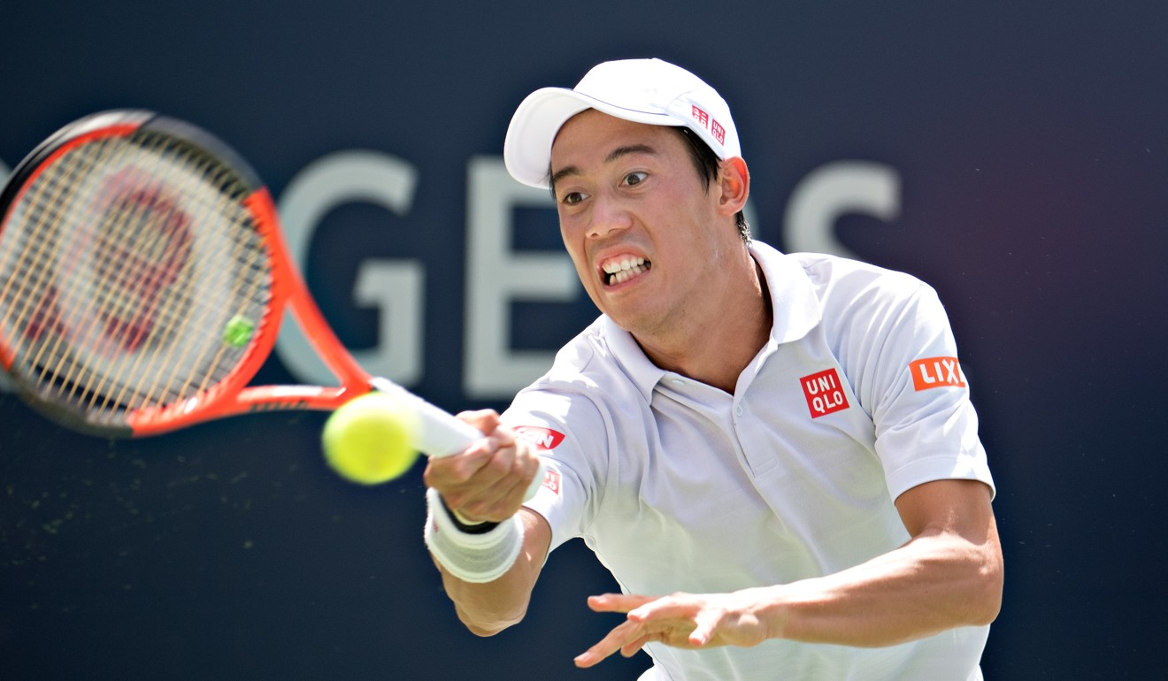 Nishikori of Japan hits the ball to Gael Monfils of France during the second round match at the Rogers Cup tennis tournament in Montreal, Canada. Photo: Xinhua