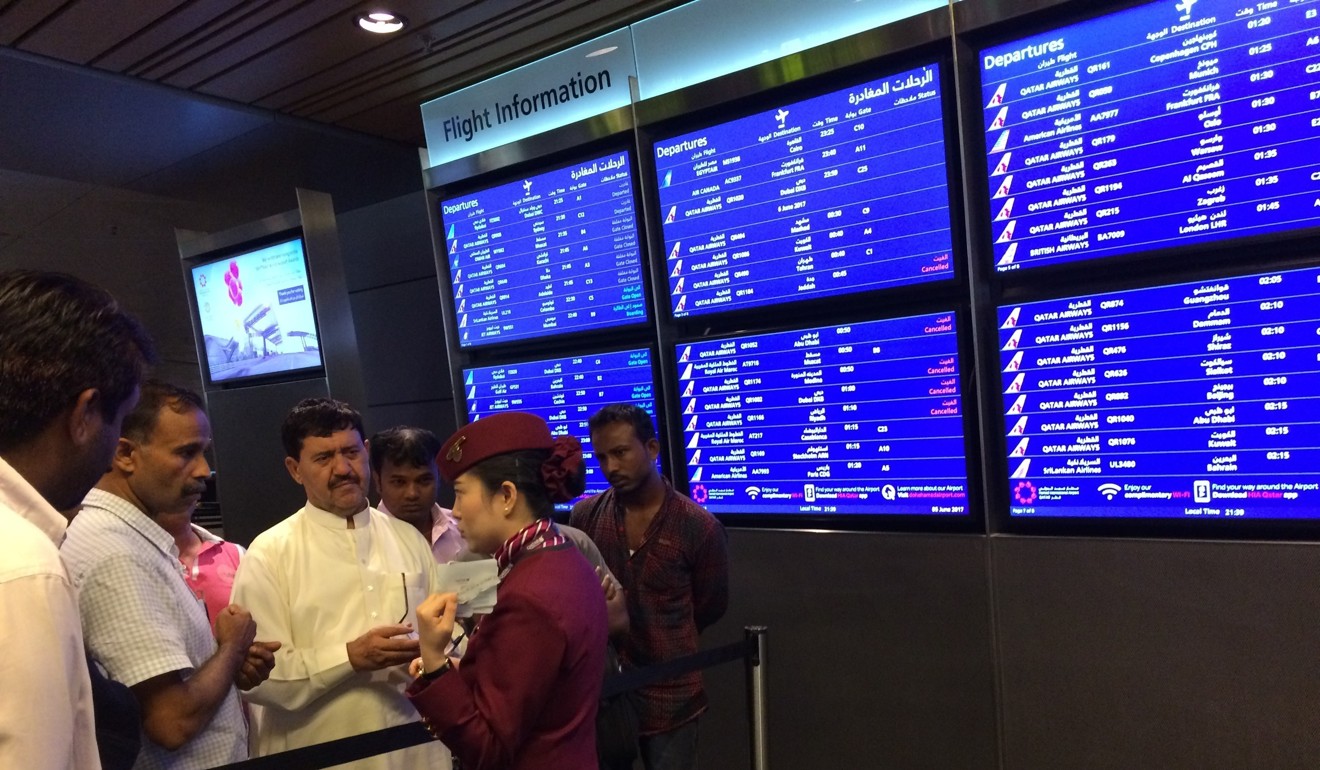 In this June file photo, passengers of cancelled flights wait in Hamad International Airport in Doha, Qatar after Saudi Arabia and other Arab powers severed diplomatic ties with Qatar and moved to isolate the energy-rich nation. Photo: AP