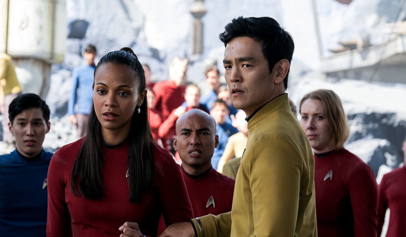 John Cho (right) as Sulu and Zoe Saldana as Uhura in the film Star Trek Beyond.