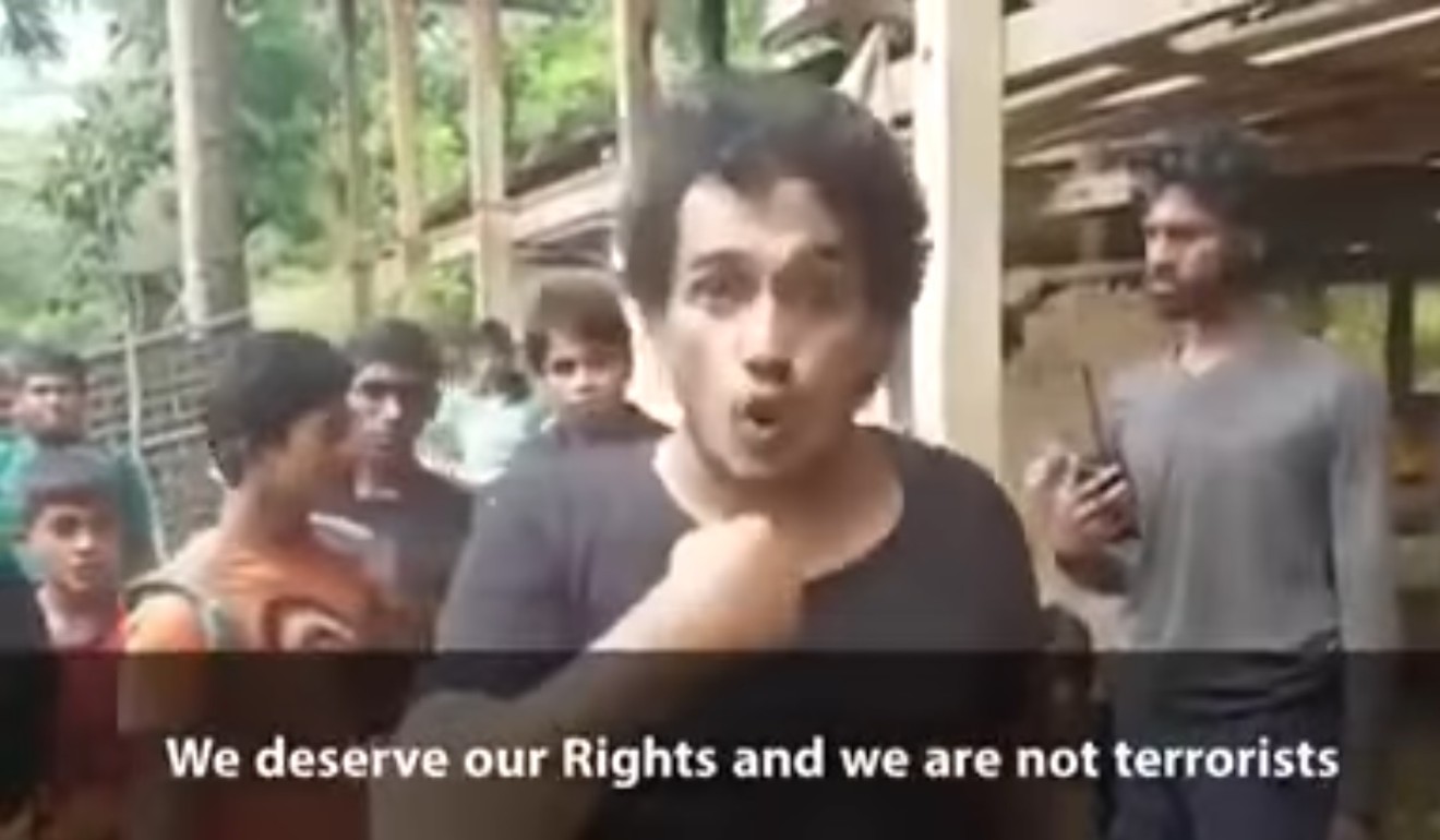 Ata Ullah, leader of Harakah al-Yaqin, a Rohingya Muslim militant group in Myanmar's Rakhine state, in a video accusing Myanmar's army and government of genocide. Photo: YouTube
