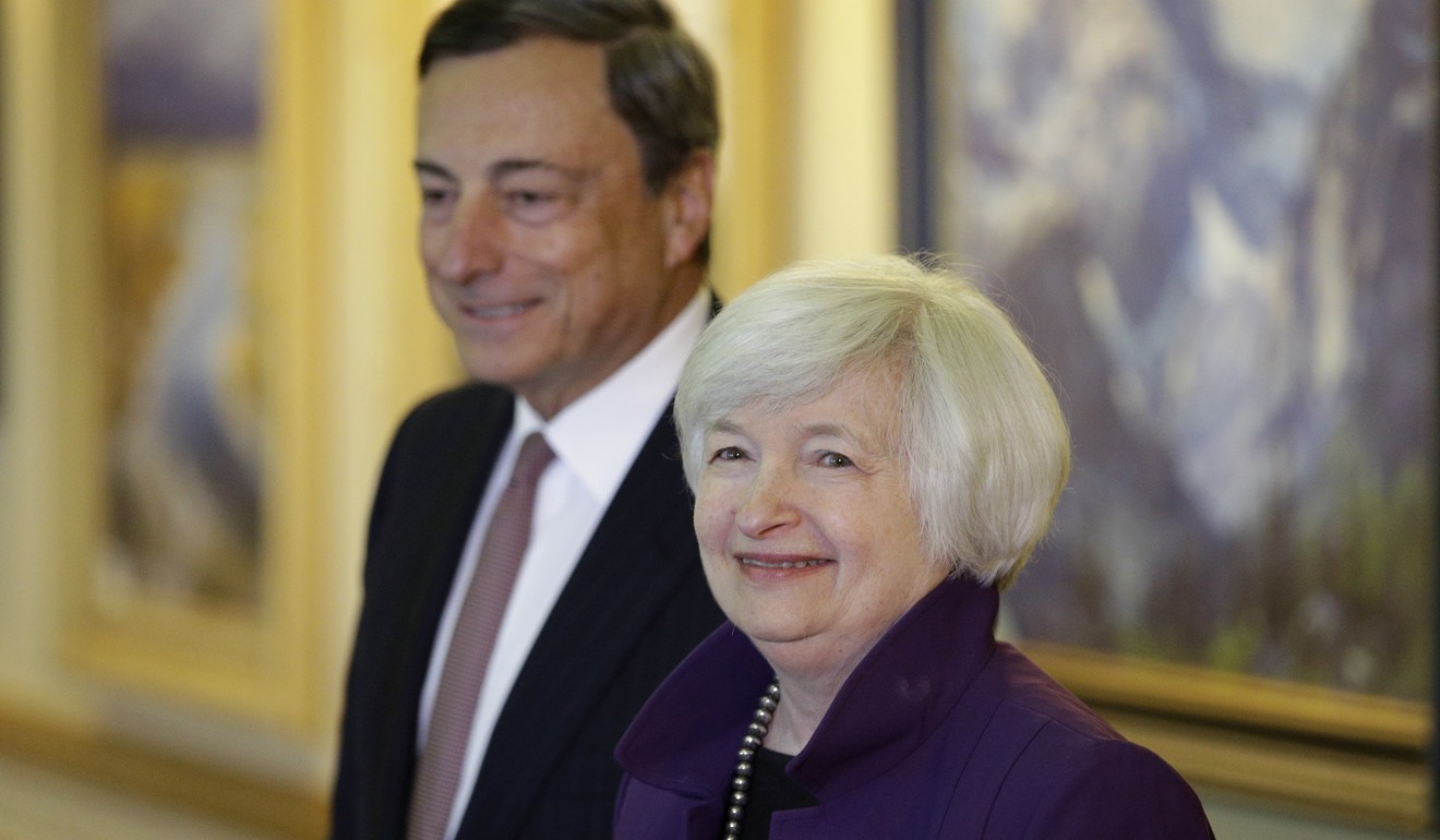 Federal Reserve Chair Janet Yellen, right, and European Central Bank President Mario Draghi walk together in 2014 during the Jackson Hole Economic Policy Symposium at the Jackson Lake Lodge in Grand Teton National Park near Jackson, Wyoming. Photo: AP