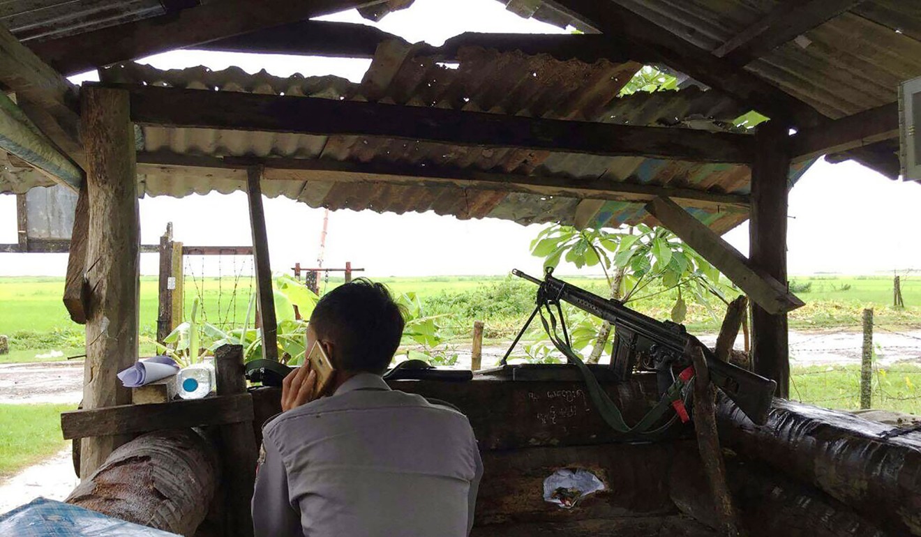 A Myanmar policeman at a checkpoint in Yathae Taung townshipm, Rakhine State. Photo: AFP