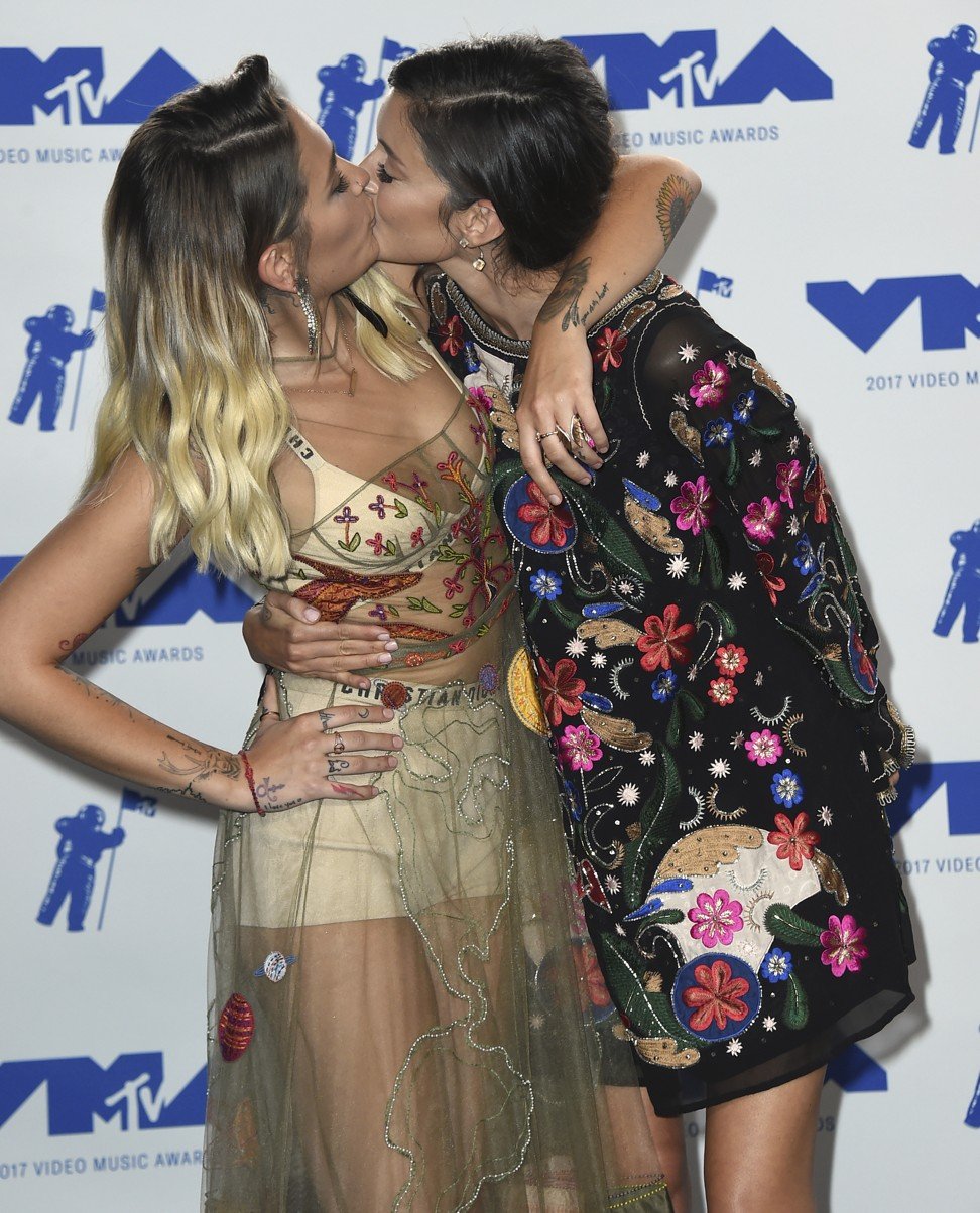 Paris Jackson, left, and Caroline D'Amore kiss in the press room at the MTV Video Music Awards. Photo: AP