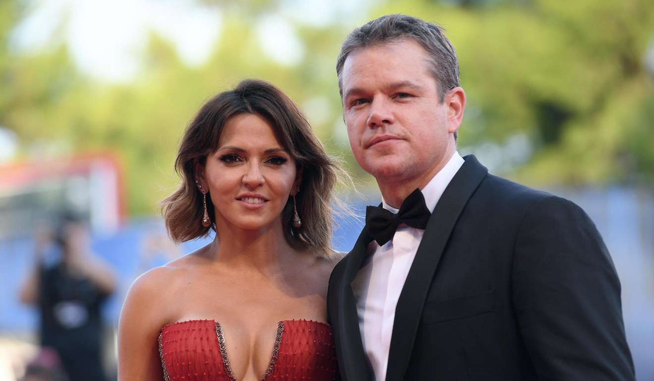 Damon and his wife Luciana Barroso arrive for the opening ceremony and screening of Downsizing at the film festival. Photo: EPA