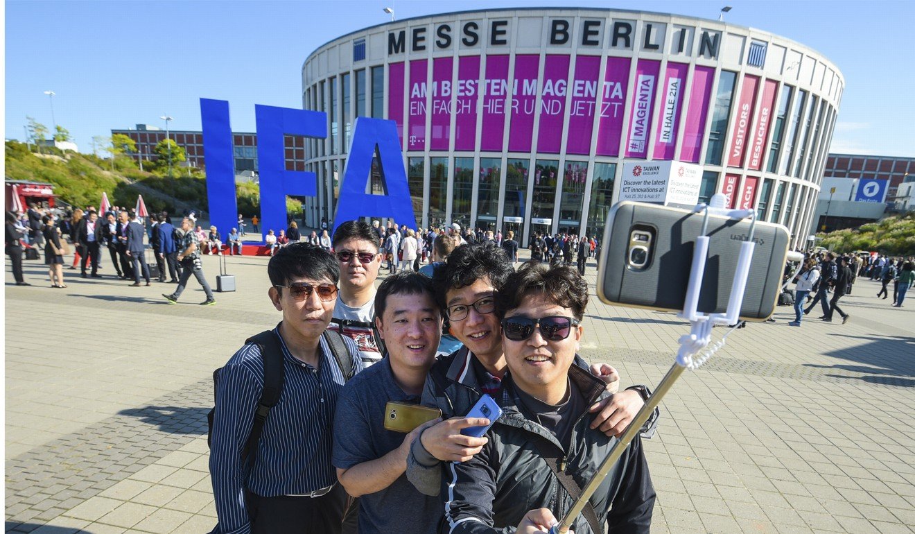 Attendees take a selfie outside Messe Berlin, the venue for IFA. Photo: Messe Berlin