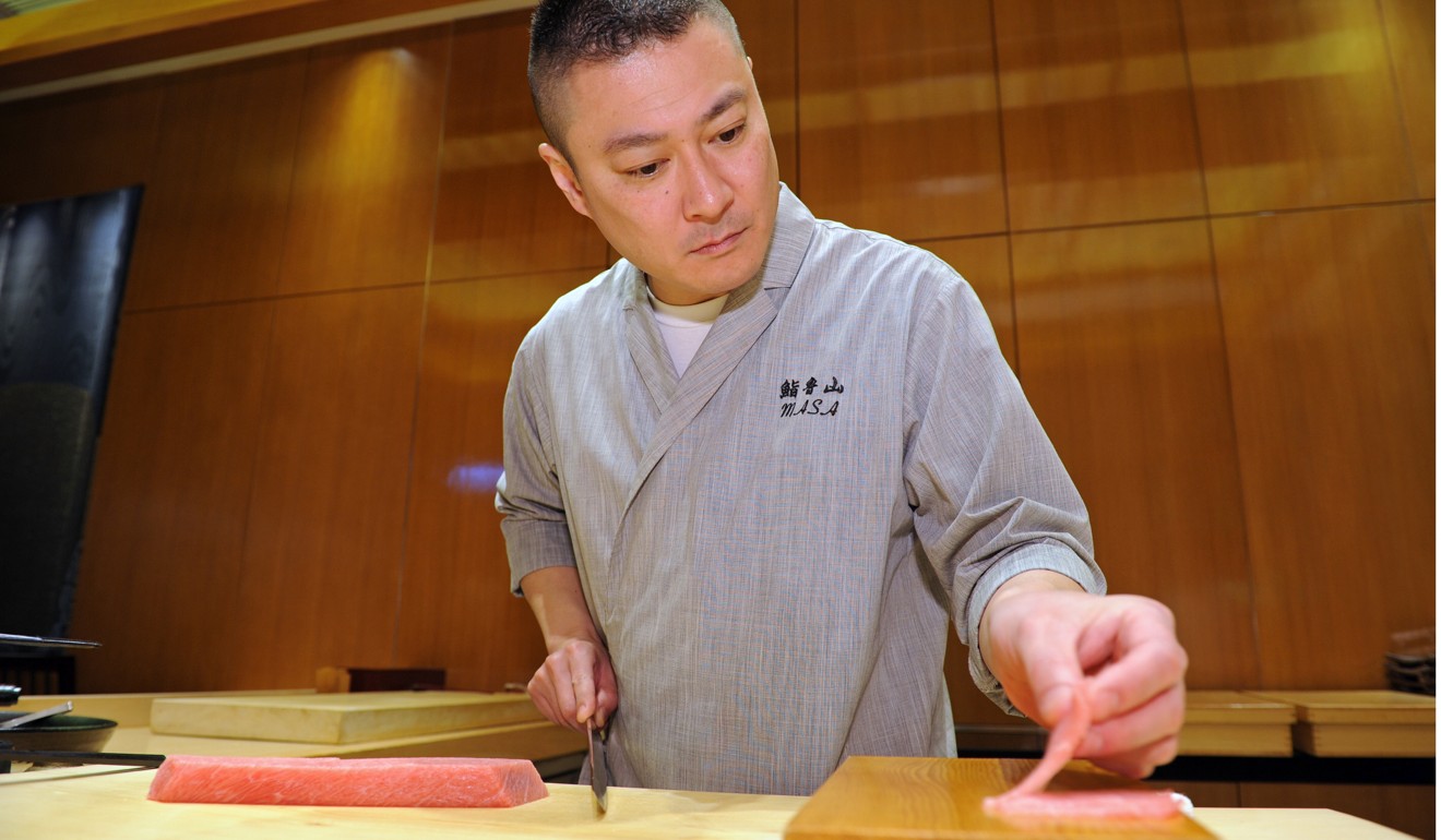 Masataka Fujisawa prepares his signature toro dish. Photo: Bruce Yan