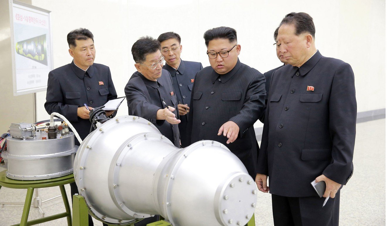 North Korean leader Kim Jong-un, second from right,inspects what was purported by state media to be a hydrogen bomb. Photo: AP