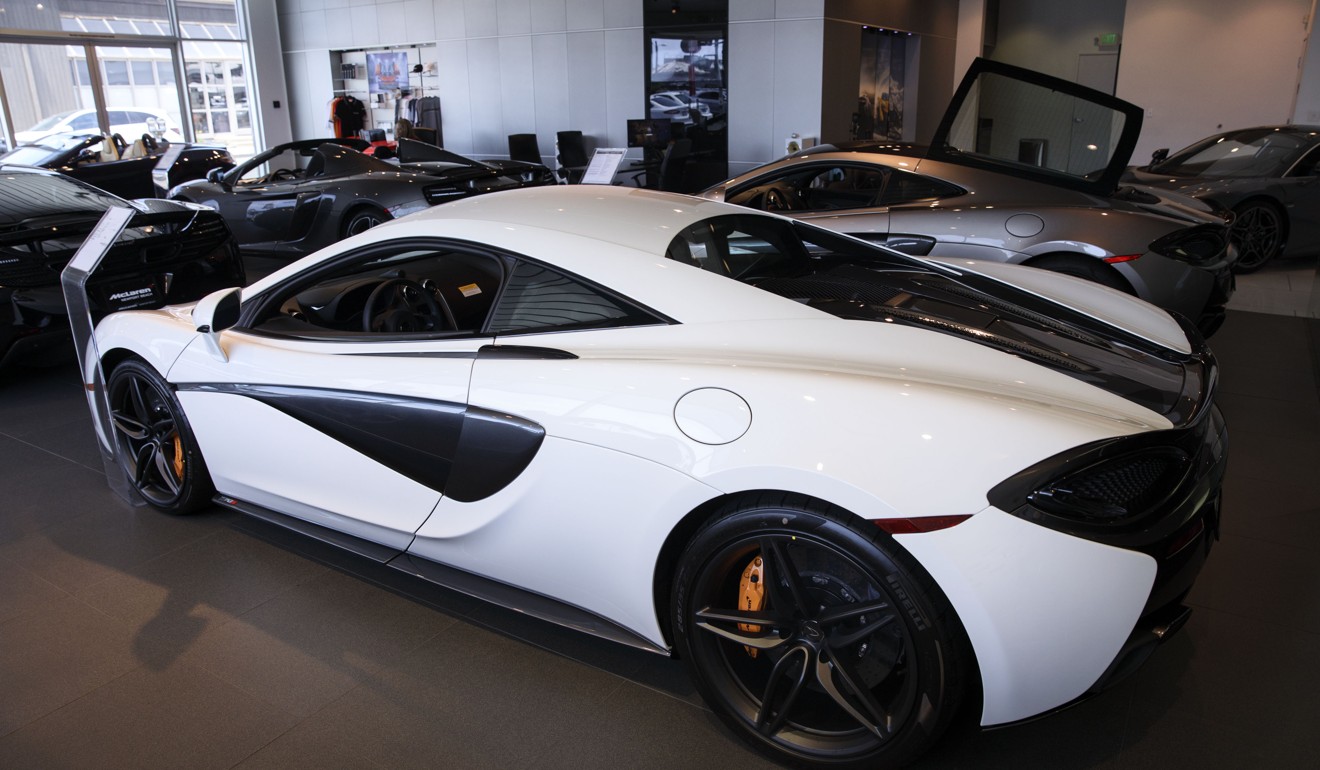 A white McLaren Automotive 570S coupe at the McLaren Newport Beach dealership in California. Photo: Bloomberg