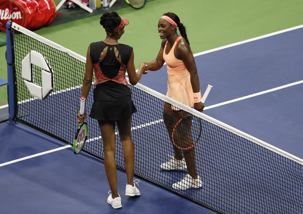 Stephens and Williams of the US meet at the net after their US Open semi-final match. Photo: EPA