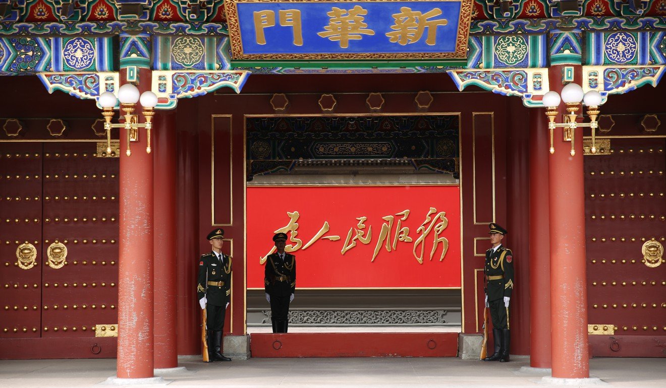 PLA soldiers stand guard at the entrance to Zhongnanhai – the headquarters of China’s leadership – in Beijing. Photo: Sam Tsang