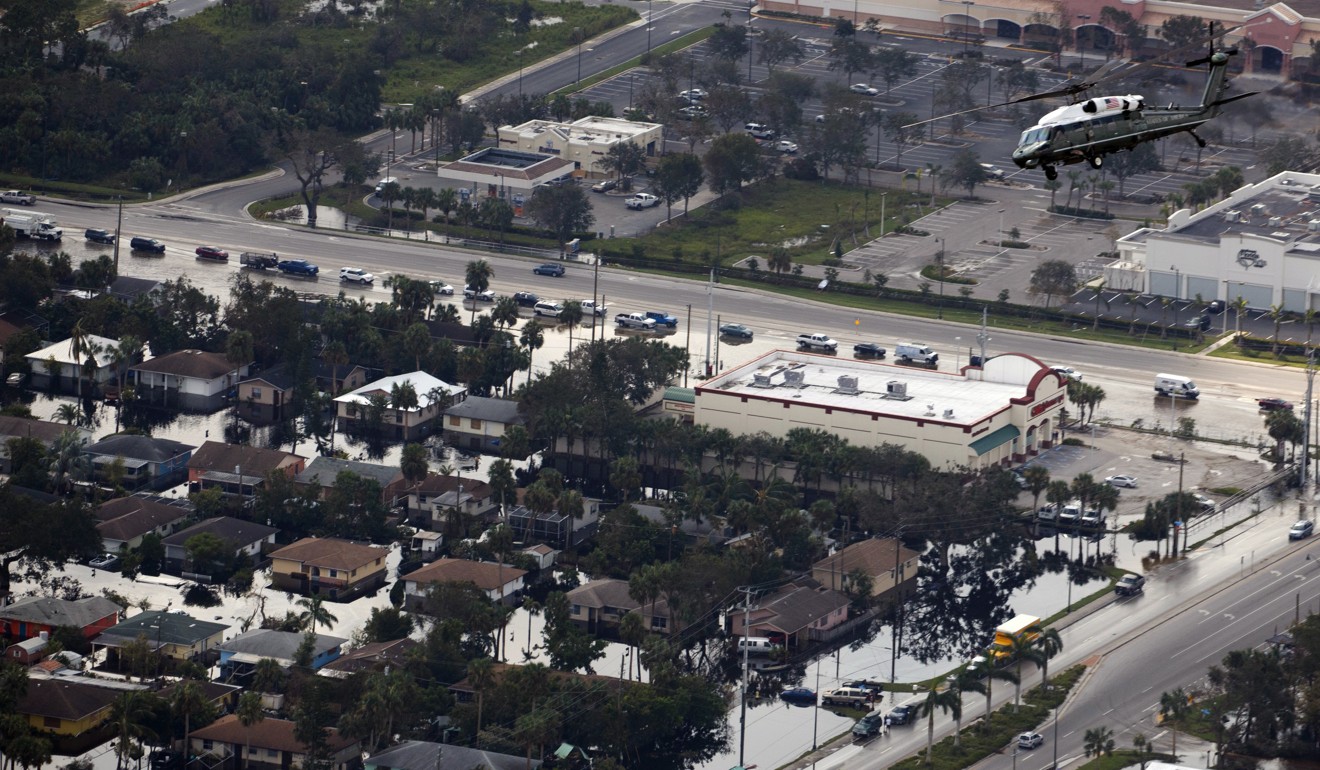 Marine One, carrying President Donald Trump, flies over areas in Florida hit hard by Hurricane Irma. Photo: AP