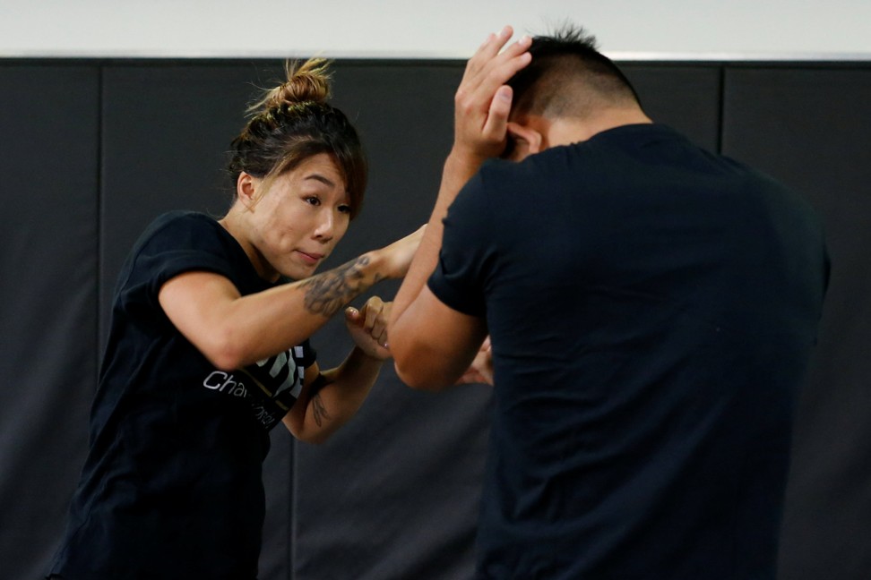 Lee trains with her brother Christian. Photo: Reuters
