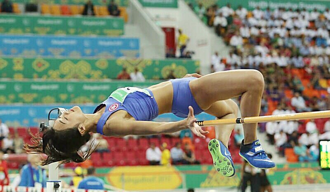 Cecilia Yeung clears the bar.