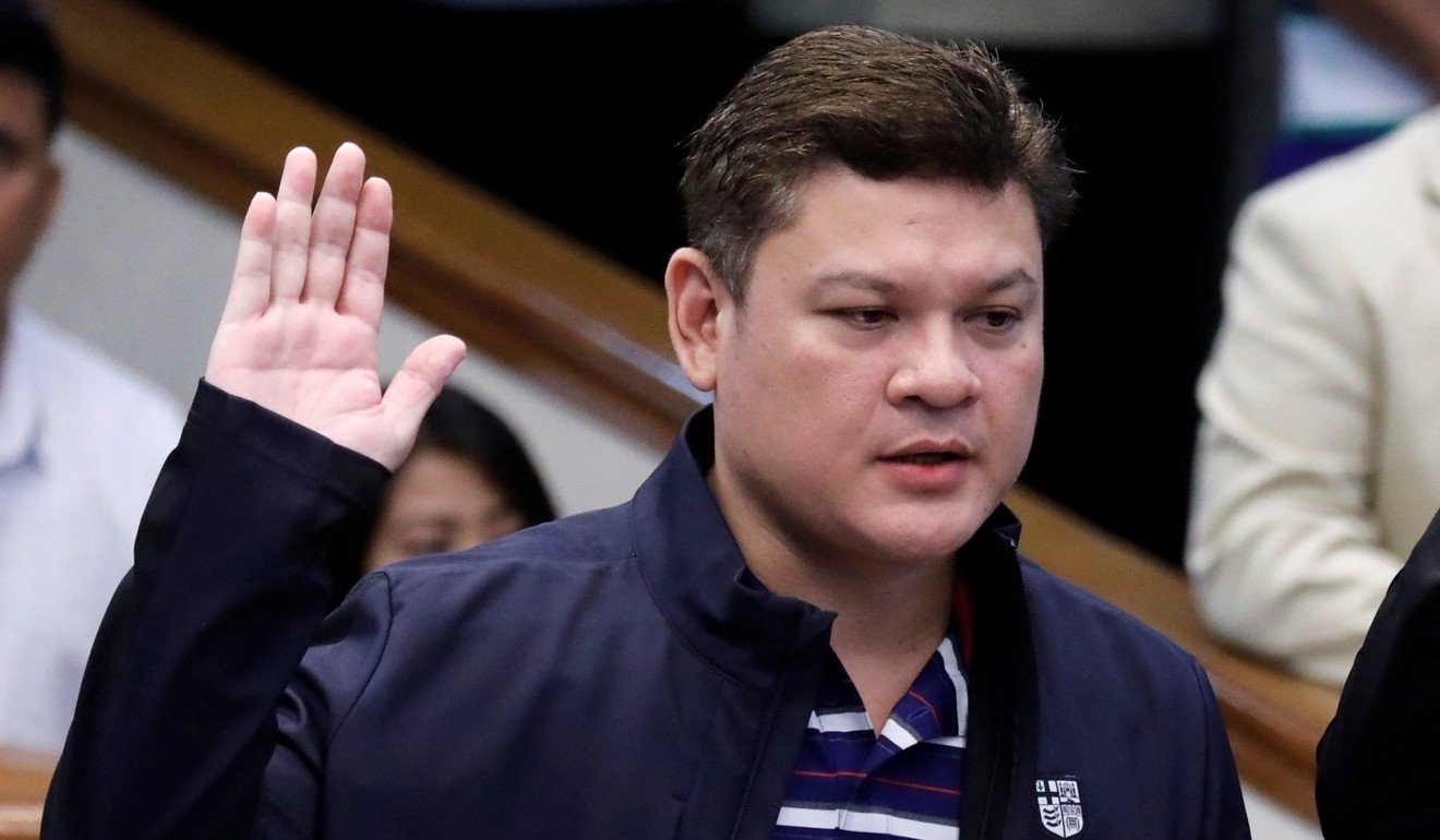 Paolo Duterte and son of President Rodrigo Duterte takes an oath as he testifies at a Senate hearing on drug smuggling. Photo: Reuters
