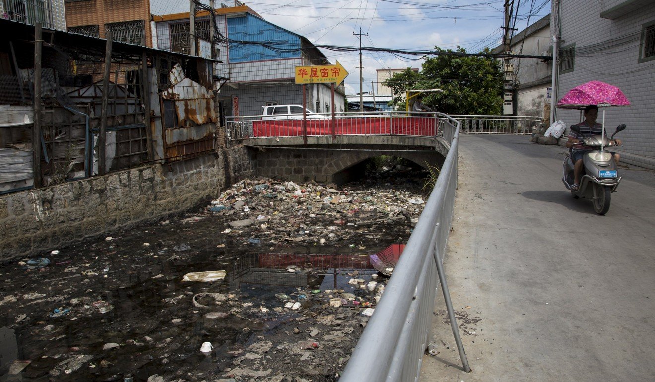 The heavily polluted Beigang River in Guiyu in June 2015. Photo: Reuters