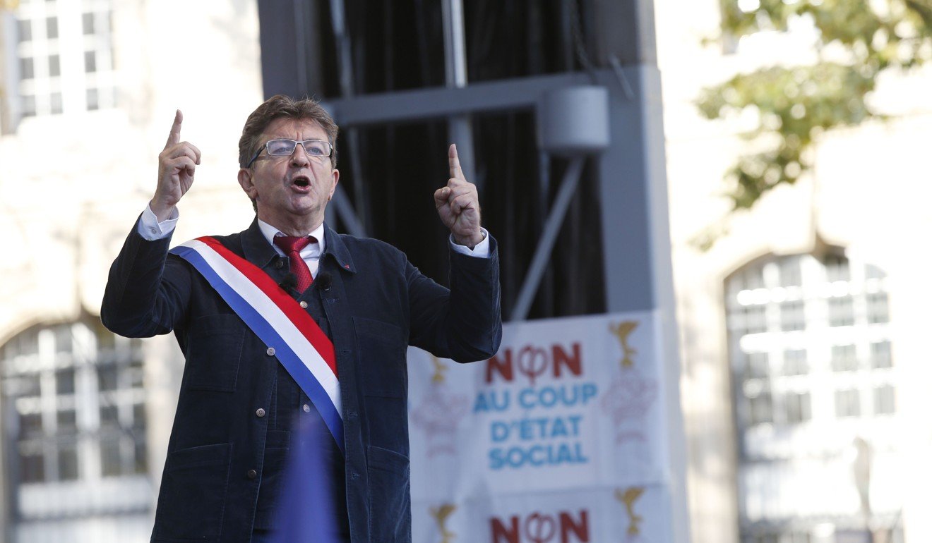 La France Insoumise (LFI) leftist party leader Jean-Luc Melenchon addresses thousands of people during a rally in Paris on Saturday. Demonstrators were protesting against the government's labour reforms, signed into law by French President Emmanuel Macron. Photo: AFP
