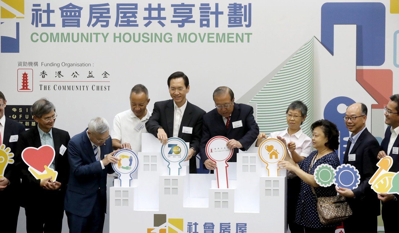 Members of the Hong Kong Council of Social Service launch the NGO group’s home-sharing scheme, to provide cheap flats for poor families waiting for public housing, on September 19. Photo: Edward Wong