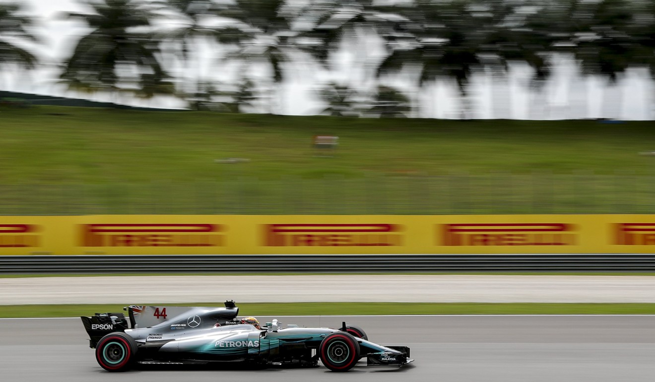 Mercedes driver Lewis Hamilton on his way to pole position. Photo: EPA
