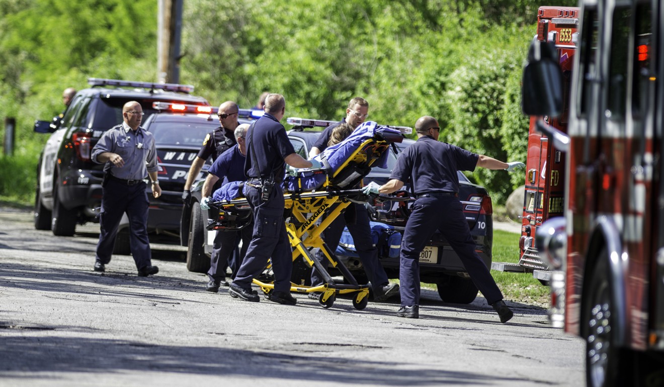 Rescuers taking Payton Leutner to an ambulance in Waukesha, Wisconsin. Photo: AP