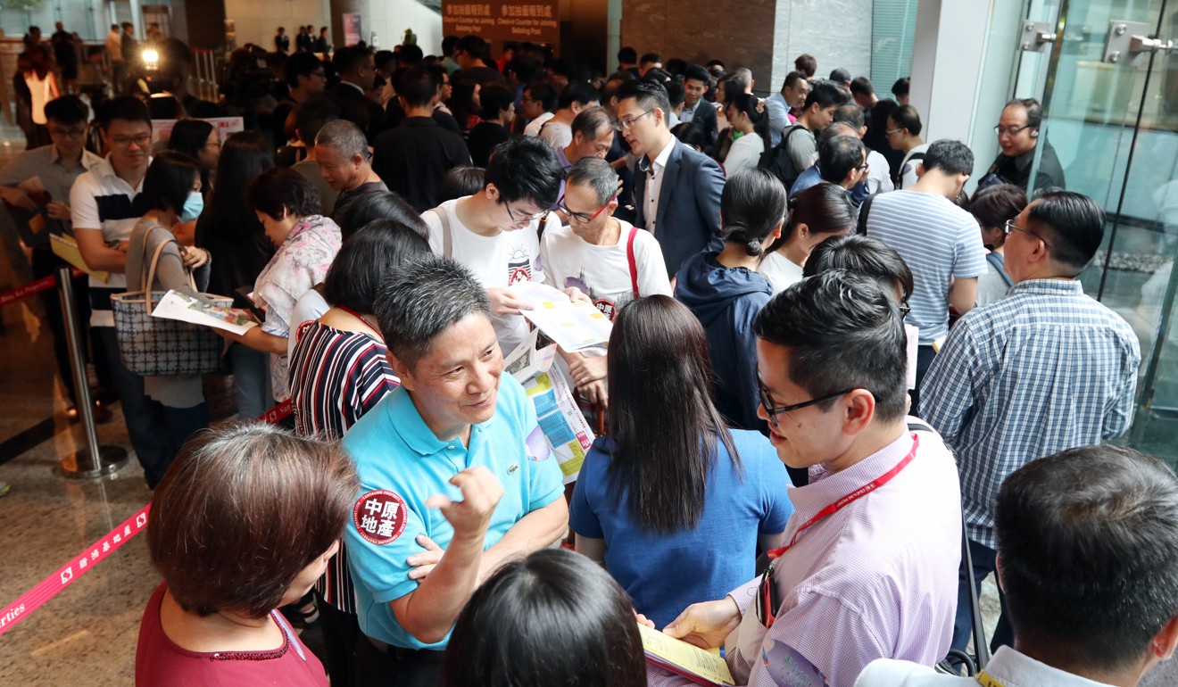 Close to 70 per cent, or about 280 flats, had been sold as of 5pm on Saturday. Photo: Roy Issa