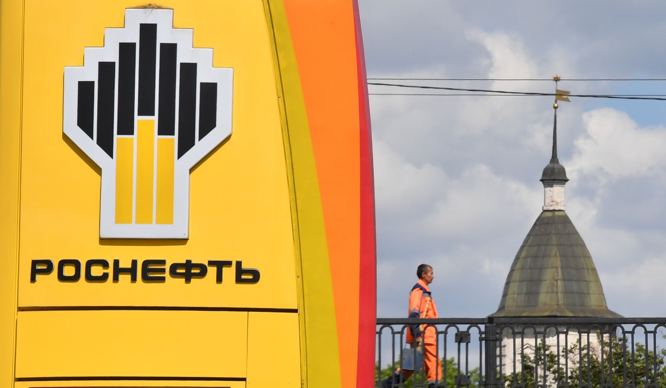 The company logo of Russia's state oil giant Rosneft is seen at a petrol station in Moscow. Photo: AFP