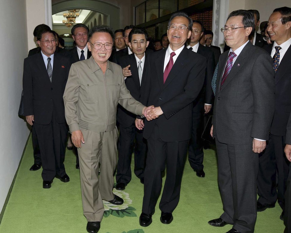 Then Chinese premier Wen Jiabao (centre) shares a light moment with North Korean leader Kim Jong-il at the state guest house in Pyongyang on October 5, 2009. Photo: AFP/KCNA via KNS