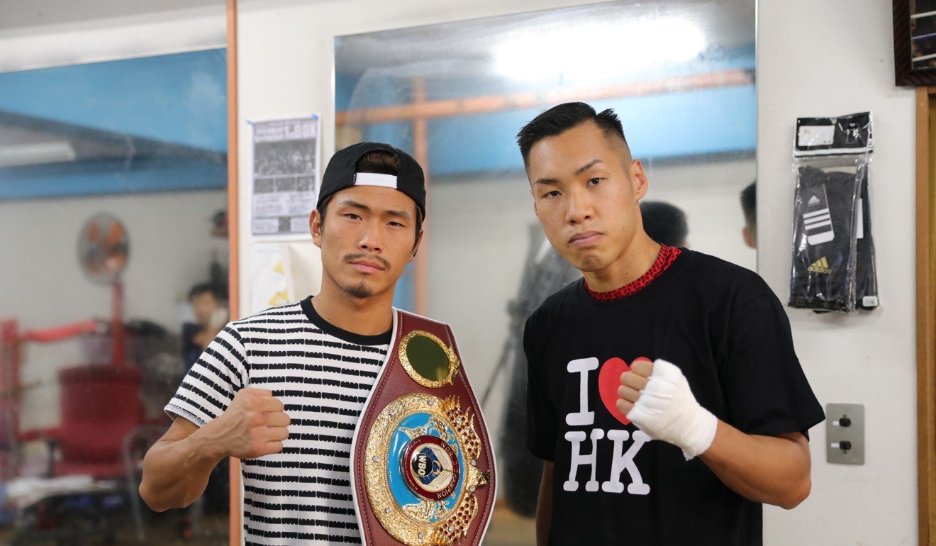 Takuya Watanabe (right) with compatriot Sho Kimura in Aoki Gym in Tokyo. Photo: Unus Alladin