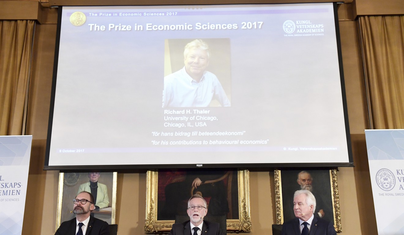 From left: Per Stromberg, chairman of the committee, Goran K Hansson, secretary of the committee, and Peter Gardenfors, member of the committee, announce Richard Thaler as the 2017 Nobel Prize in Economics winner. Photo: AP