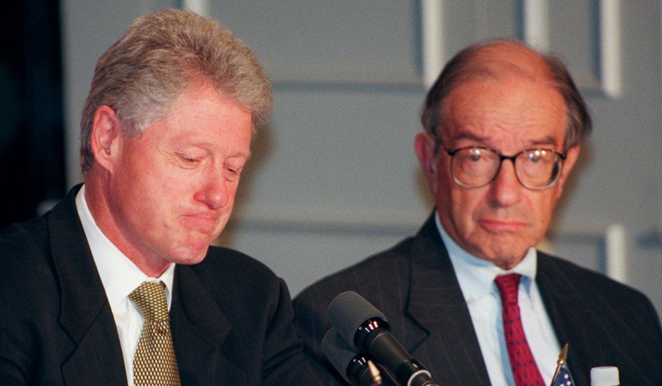 President George H W Bush blamed his 1992 defeat to Bill Clinton (l) on the failure of Fed chairman Alan Greenspan (r) to ease policy more aggressively ahead of the election. Photo: AFP