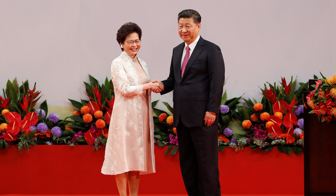 Lam pledged to uphold Hong Kong’s ‘one country, two systems’ governing formula. Photo: Reuters