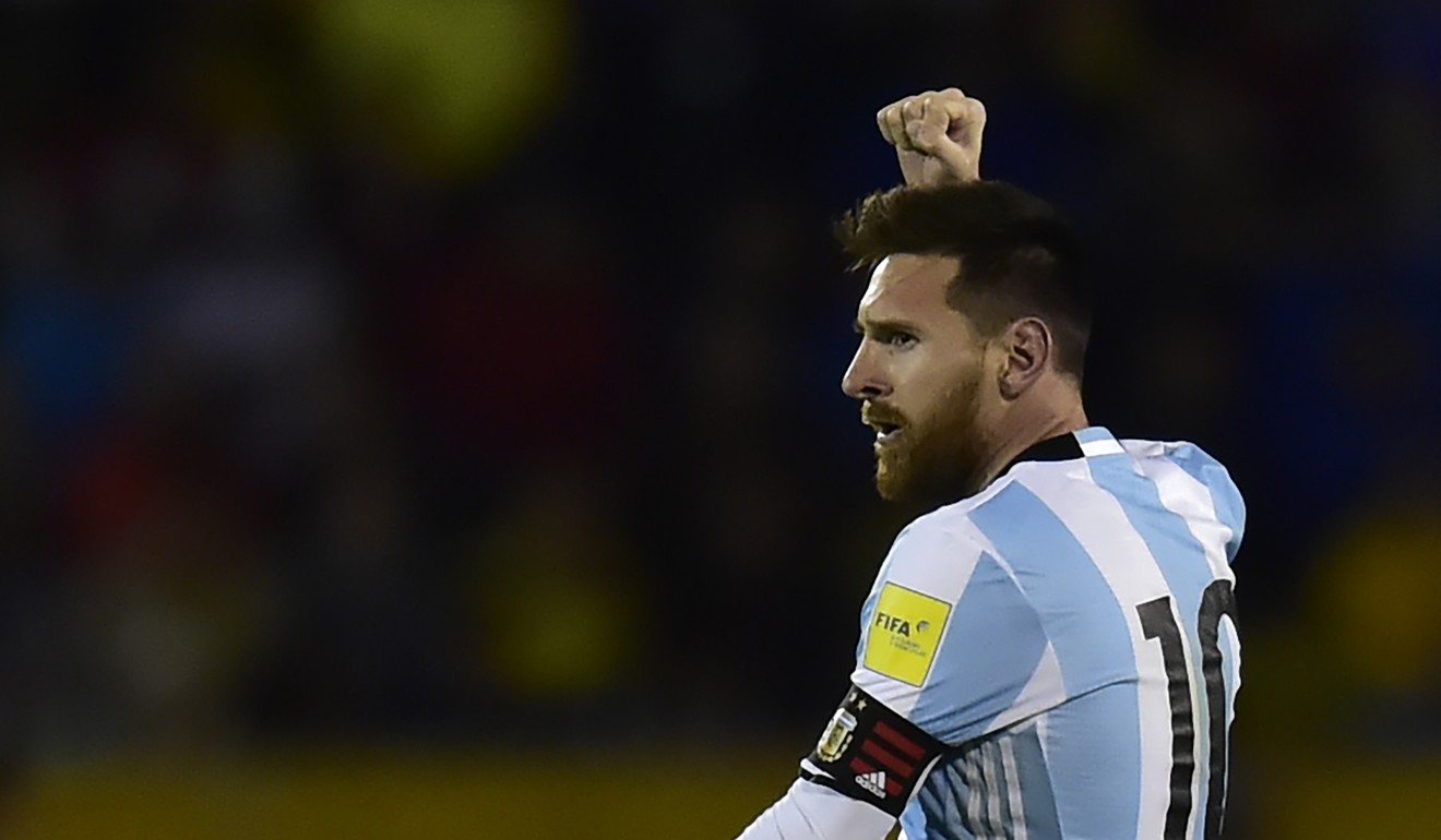 Argentina's Lionel Messi celebrates after scoring his third goal against Ecuador during their 2018 World Cup qualifier football match in Quito, on October 10, 2017. Photo: AFP