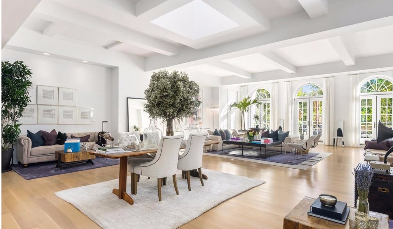 A private elevator opens up to a sun-filled great room with a skylight and three sets of French doors boasting up-close views of Madison Square Park. The penthouse has four bedrooms and six-and-a half bathrooms.