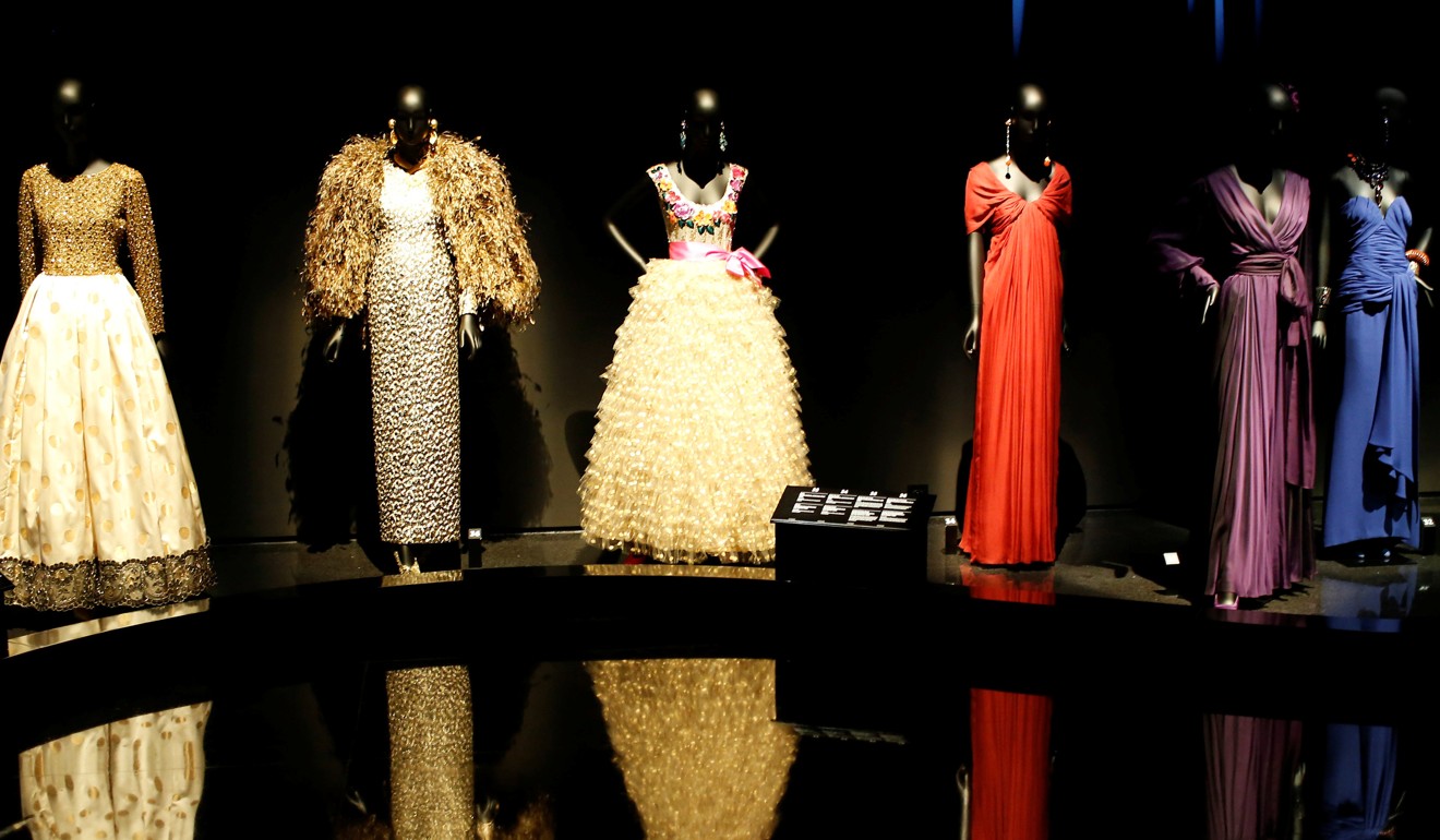 Dresses and hat creations are displayed at the new museum in Marrakesh, along with a wall of photographs retracing the reclusive Saint Laurent’s life and career. Photo: Reuters