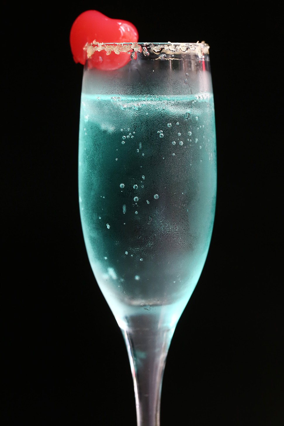 A champagne cocktail known as the Sweet Drink is made at the Loyal Bar. Photo: Jonathan Wong
