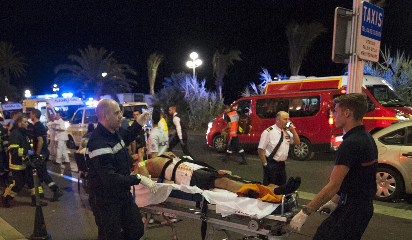 Wounded people are evacuated after a truck crashed into a crowd during Bastille Day celebrations in Nice in 2016. The EU has pledged millions of dollars to try to guard cities against such attacks. Photo: EPA